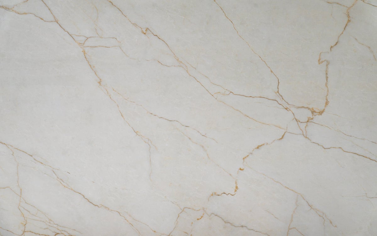 Light marble surface with delicate gold veins